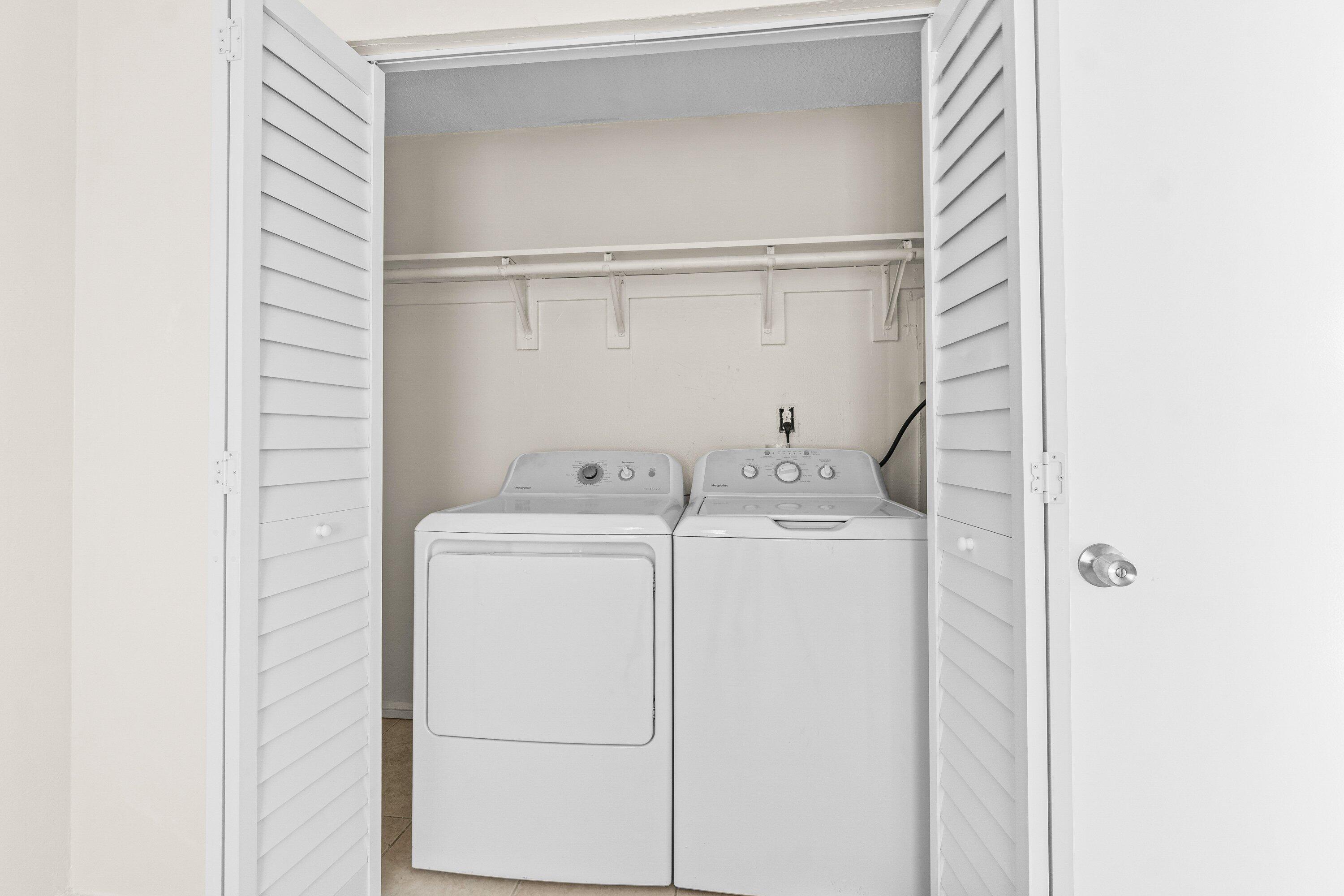 4869 Gulfstream Road Lake Worth, FL 33461 - Photo 16 of 20 a utility room with dryer and washer