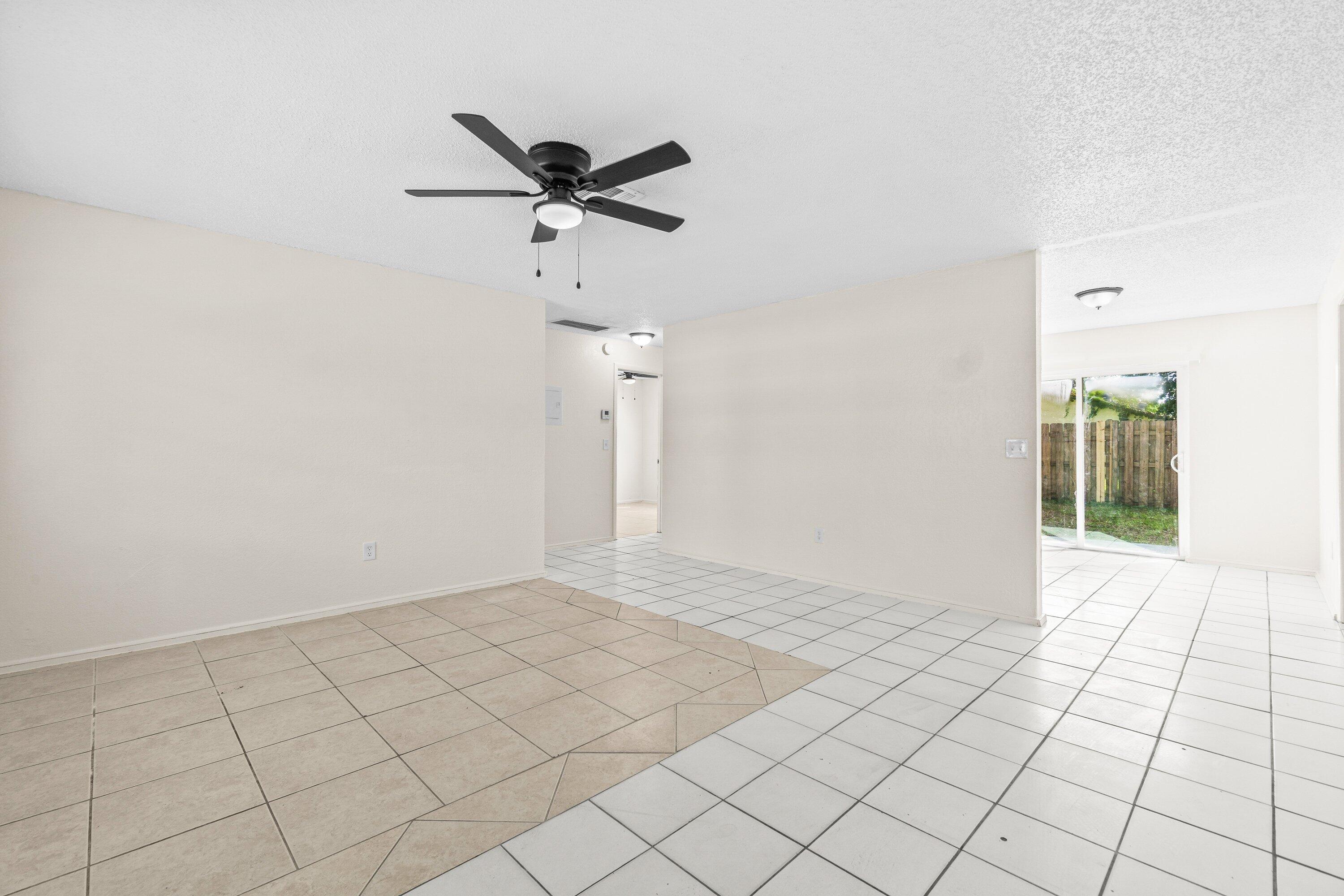 4869 Gulfstream Road Lake Worth, FL 33461 - Photo 8 of 20 a view of an empty room and window