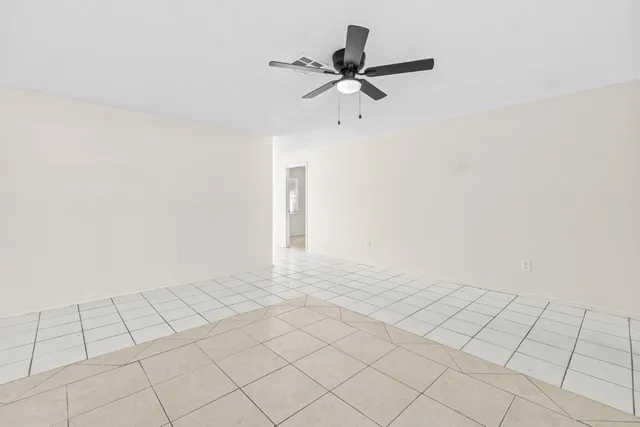 a view of an empty room and window