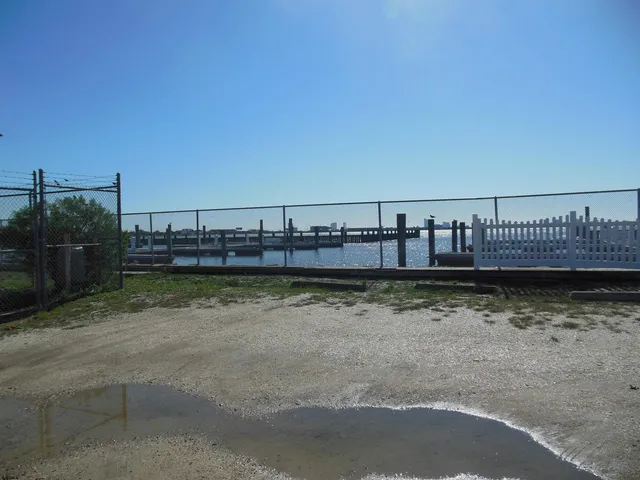 a view of a swimming pool with a chair