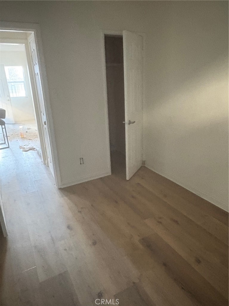 10206 South Vermont Avenue Los Angeles, CA 90044 - Photo 4 of 11 an empty room with windows