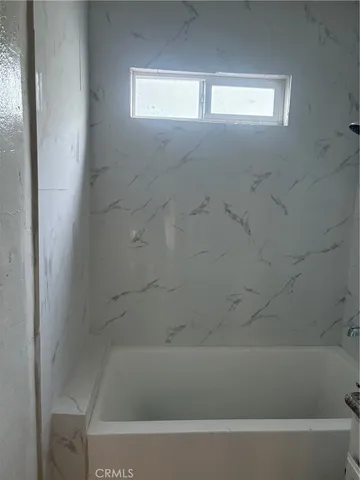 a bathroom with a bathtub