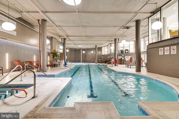 a view of a hallway with bathroom