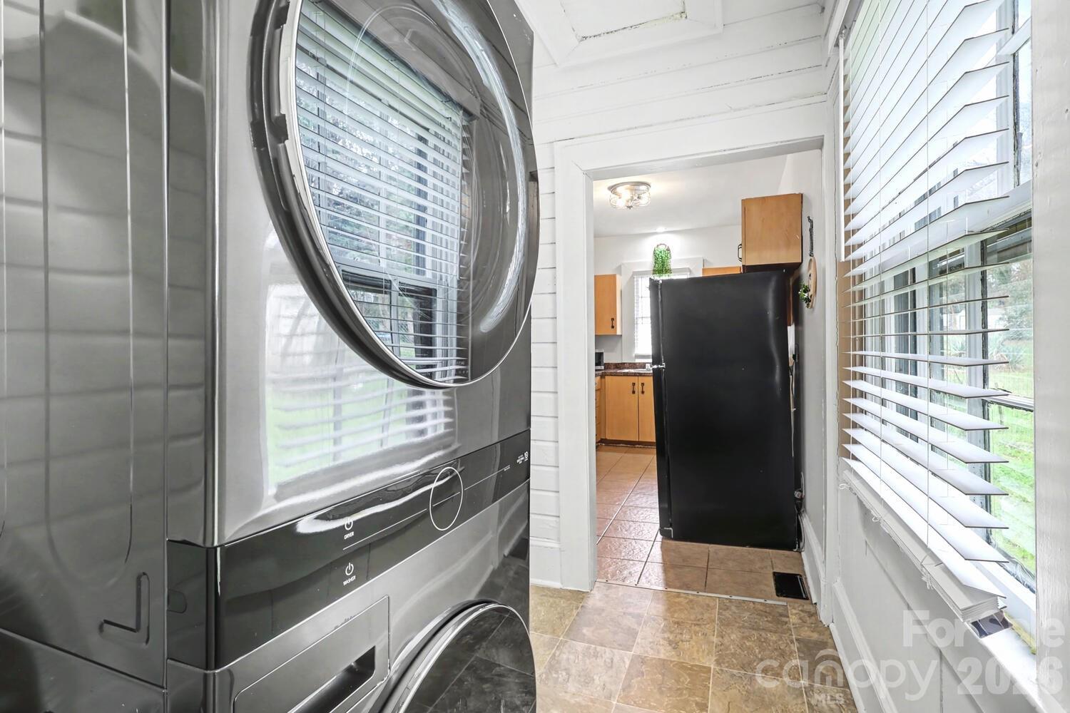 335 South Torrence Street Charlotte, NC 28204 - Photo 20 of 21 a view of a kitchen from a corridor