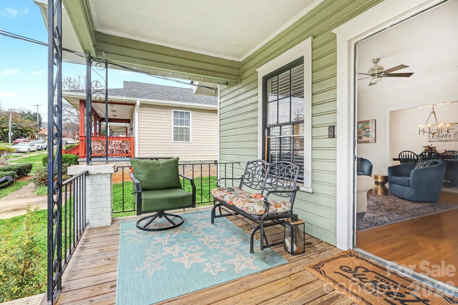 335 South Torrence Street Charlotte, NC 28204 - Photo 3 of 21 a balcony with furniture and a potted plant