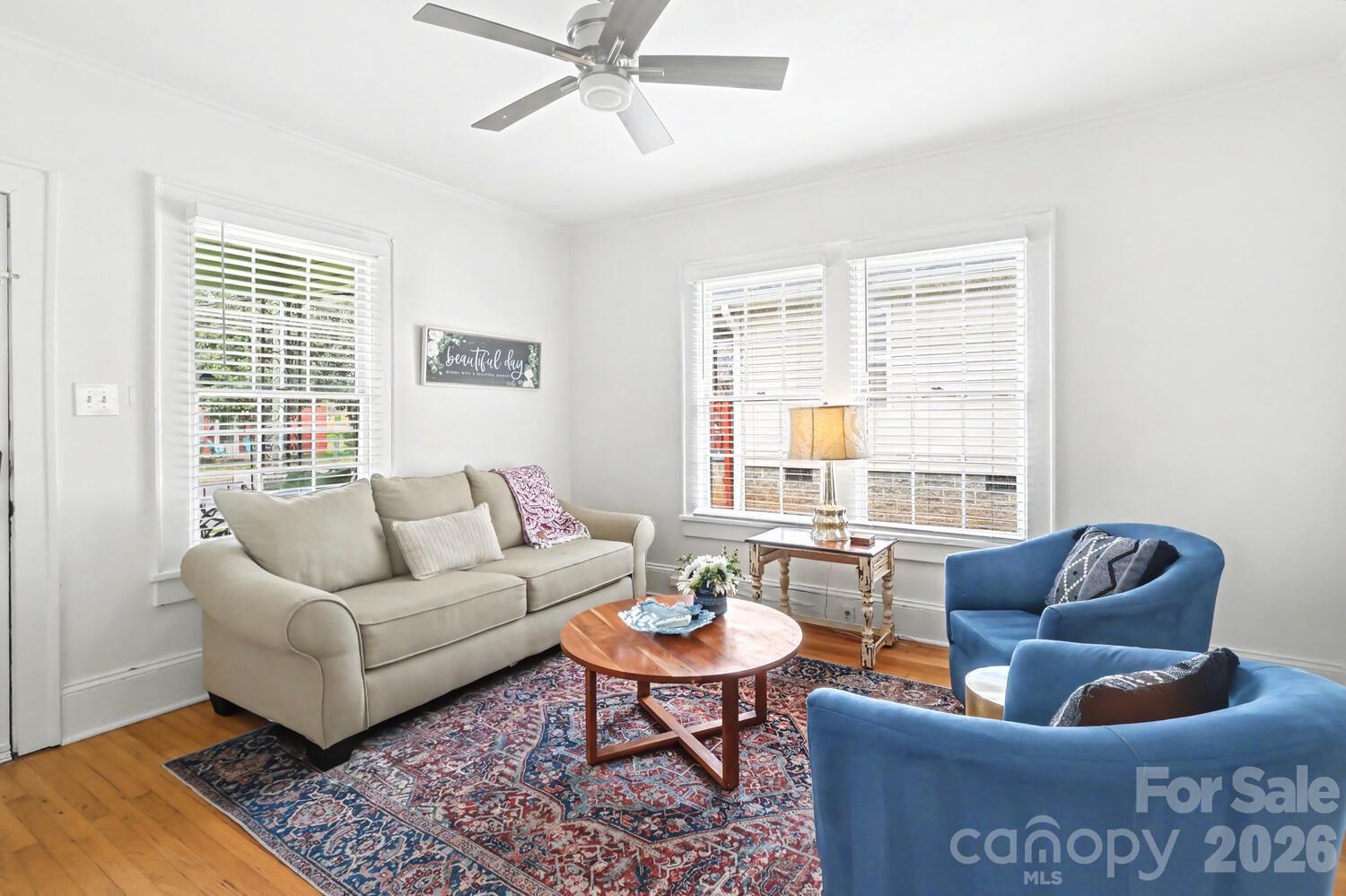 335 South Torrence Street Charlotte, NC 28204 - Photo 6 of 21 a living room with furniture and a large window
