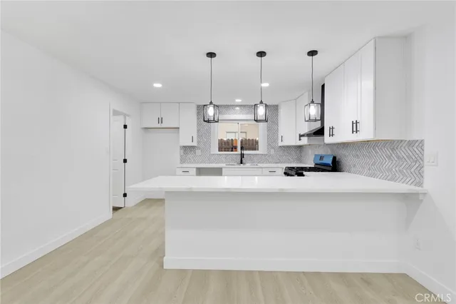 a view of kitchen with stainless steel appliances
