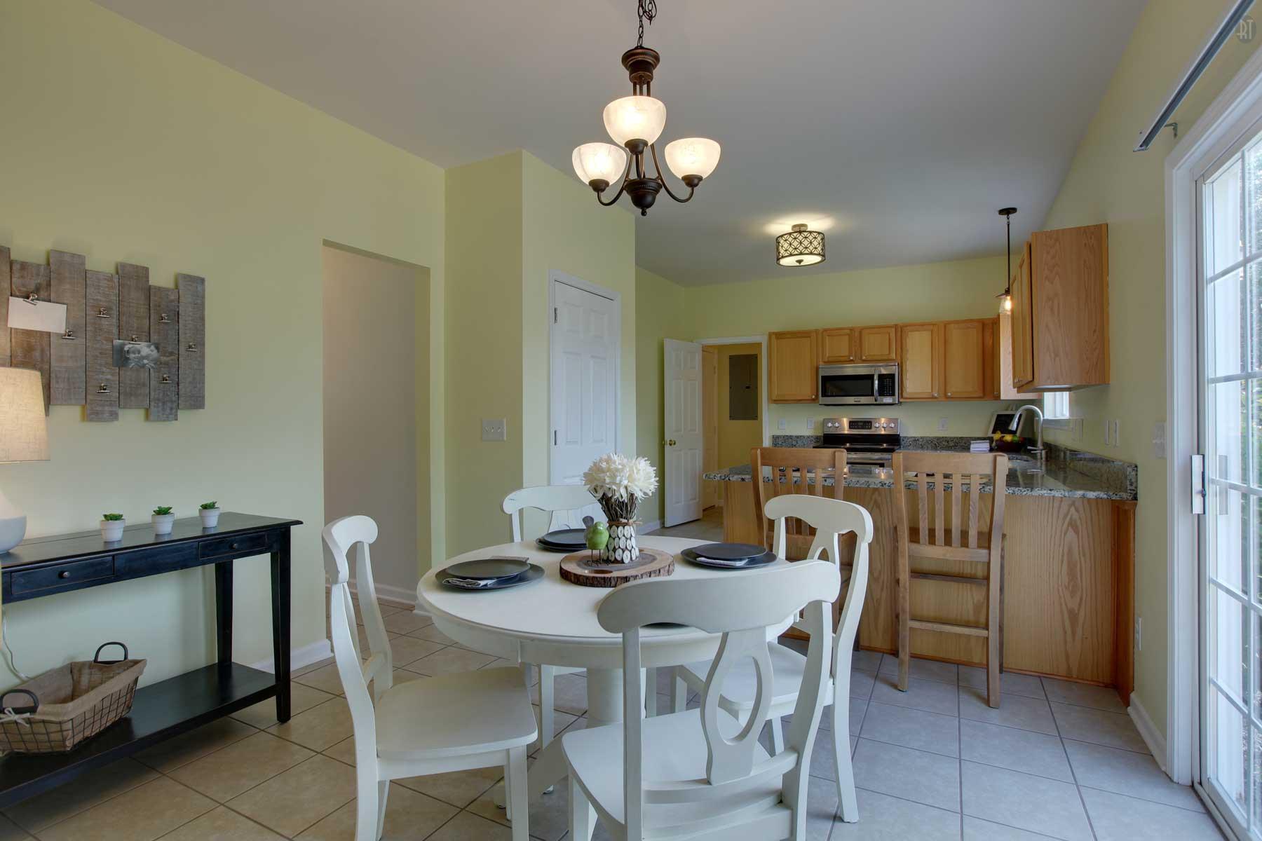 1735 Liberty Pike Franklin, TN 37067 - Photo 11 of 30 a dining room with furniture and chandelier