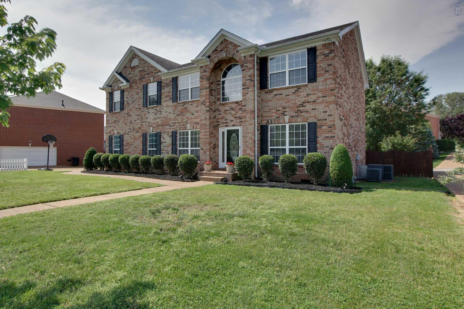 1735 Liberty Pike Franklin, TN 37067 - Photo 2 of 30 a front view of a house with a yard