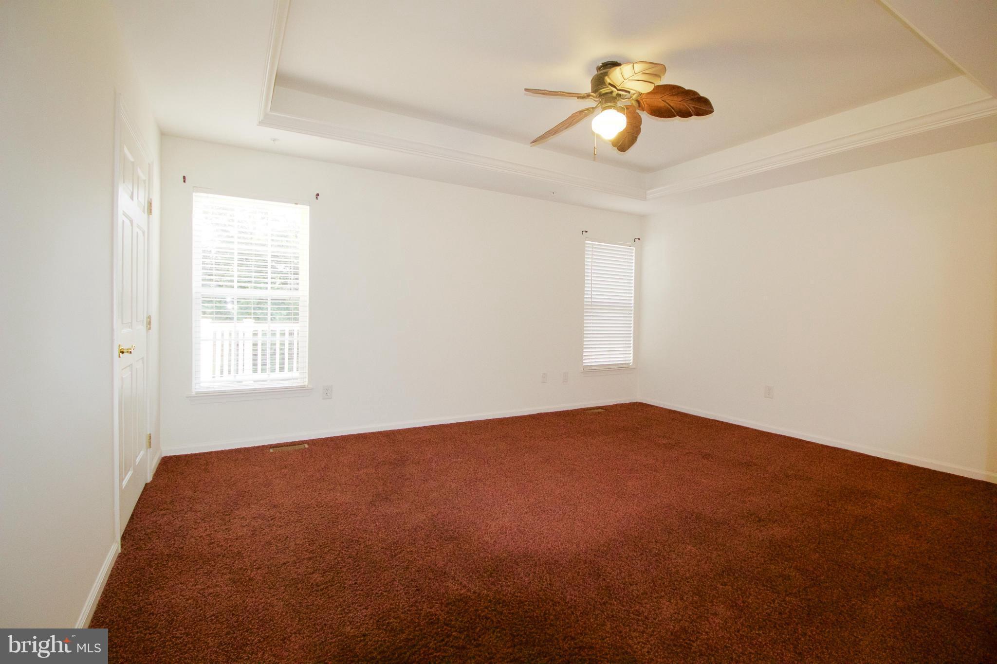 8411 Meadowsweet Road Pikesville, MD 21208 - Photo 13 of 30 a view of an empty room with a window