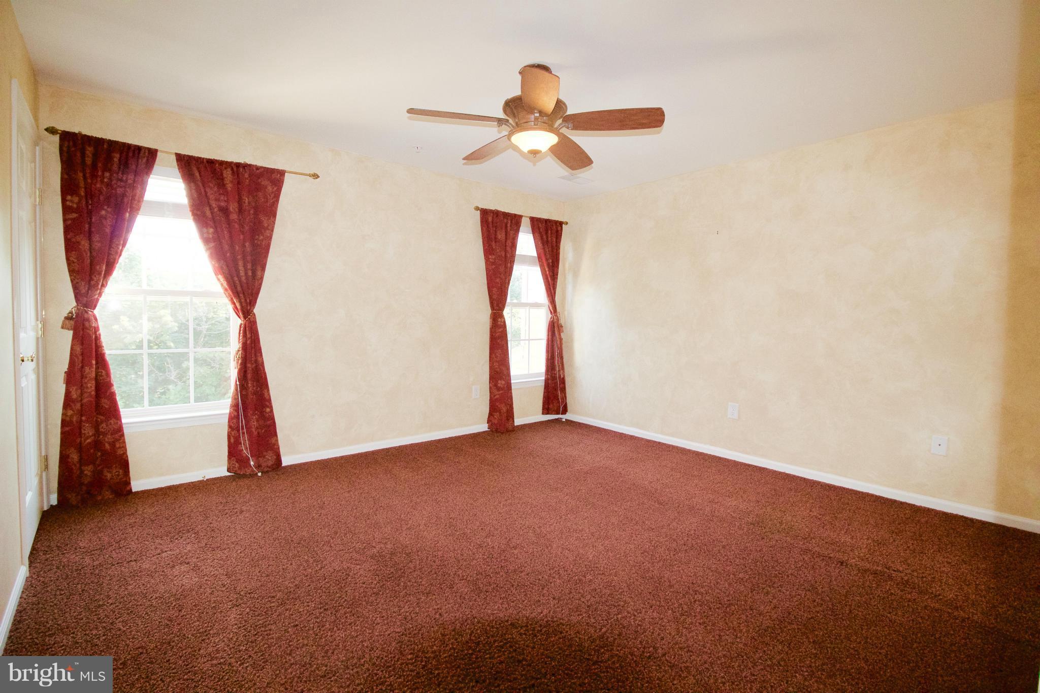 8411 Meadowsweet Road Pikesville, MD 21208 - Photo 19 of 30 a view of an empty room with a window