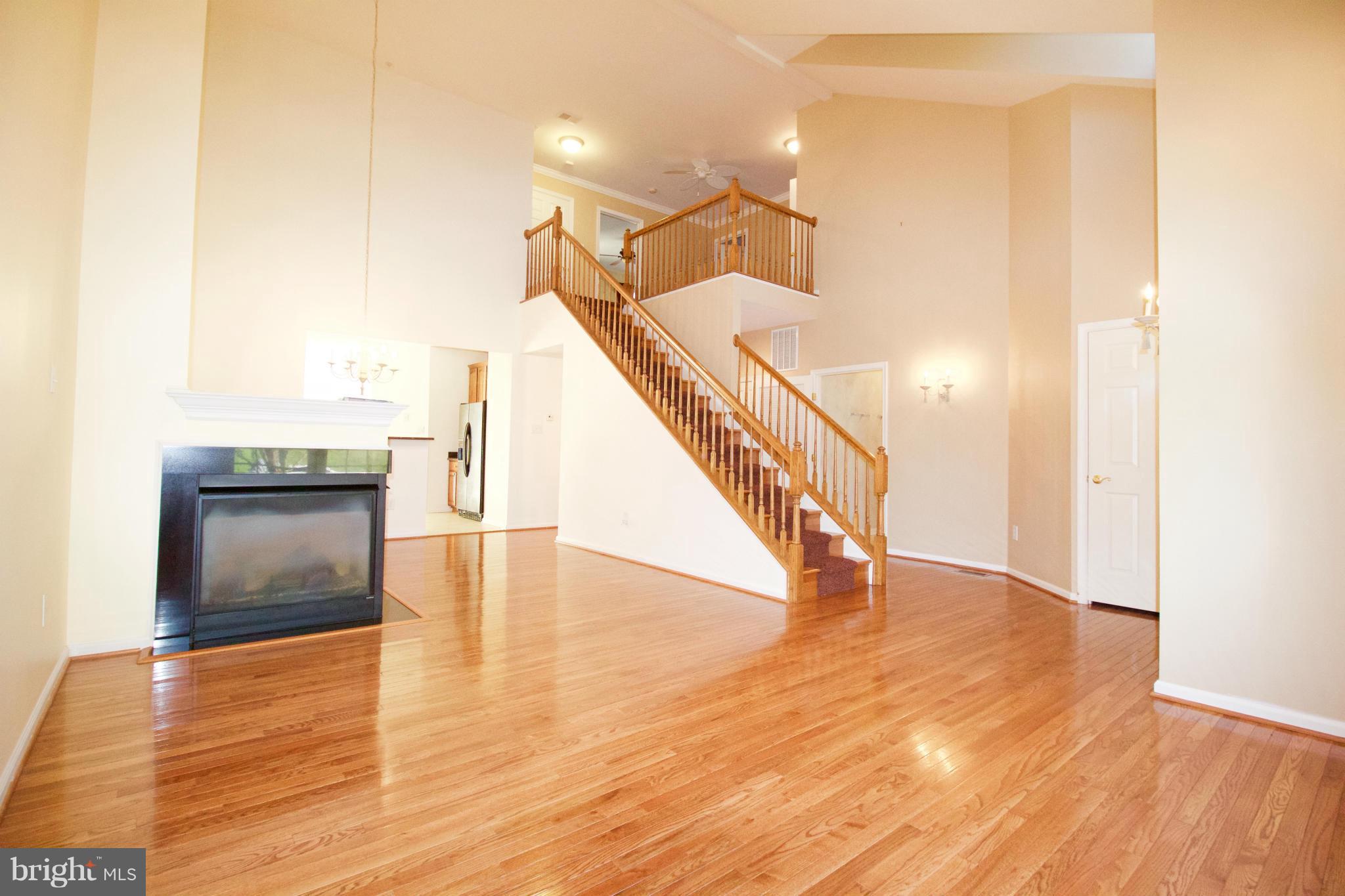 8411 Meadowsweet Road Pikesville, MD 21208 - Photo 3 of 30 a view of an entryway with wooden floor