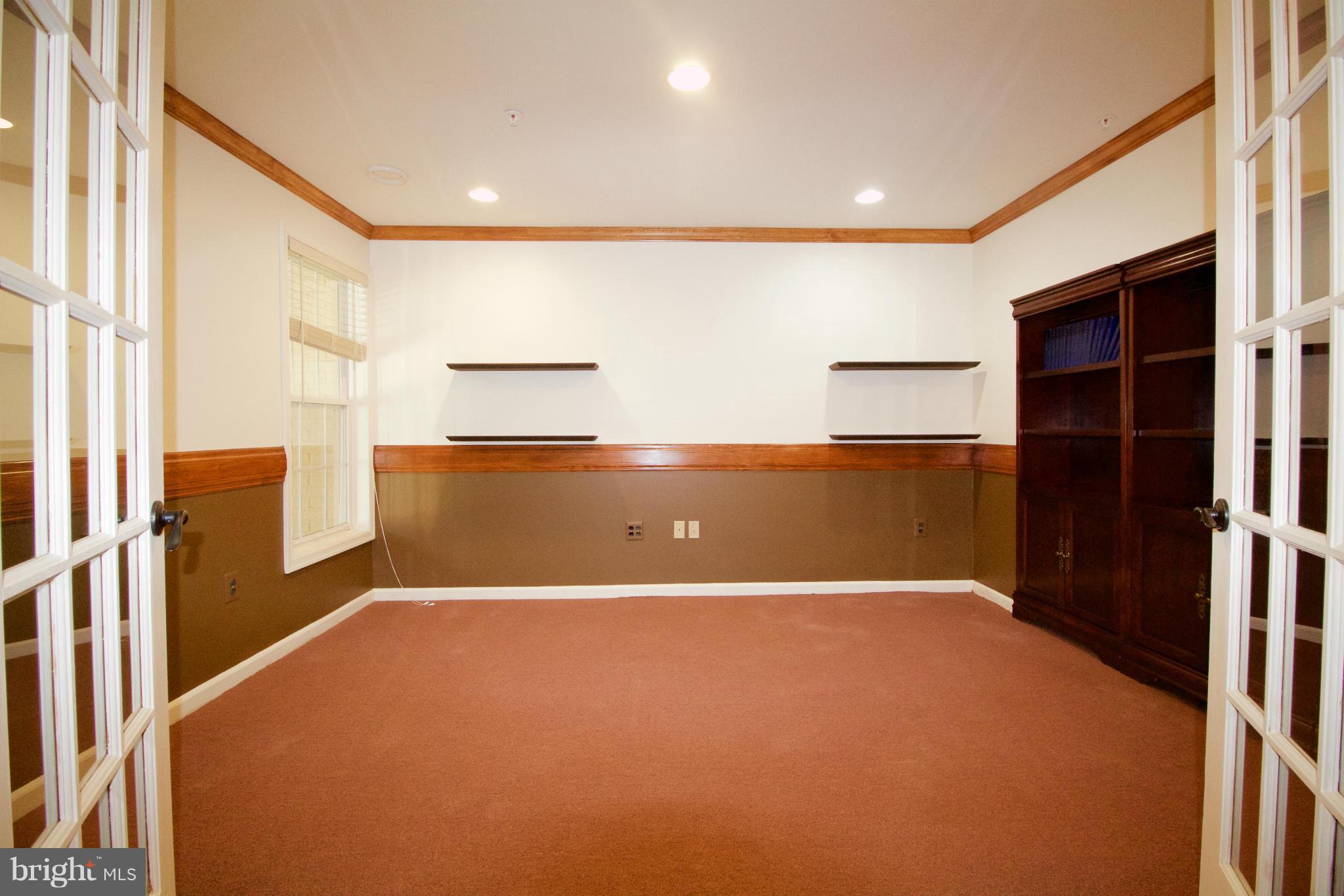 8411 Meadowsweet Road Pikesville, MD 21208 - Photo 27 of 30 a view of an empty room with a window