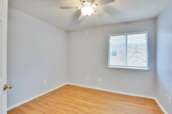 a bathroom with a toilet and a bathtub