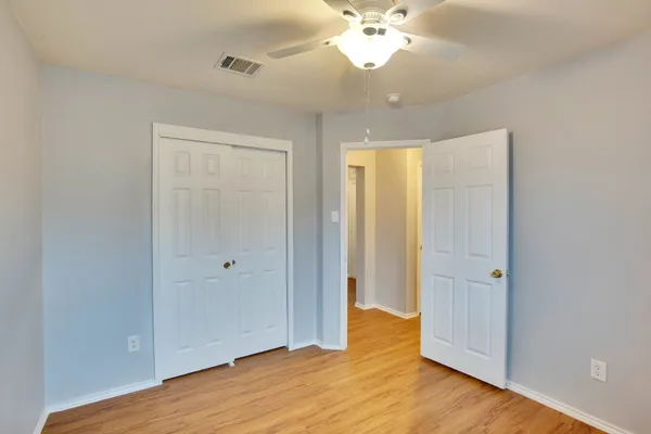 a view of a hallway with front door