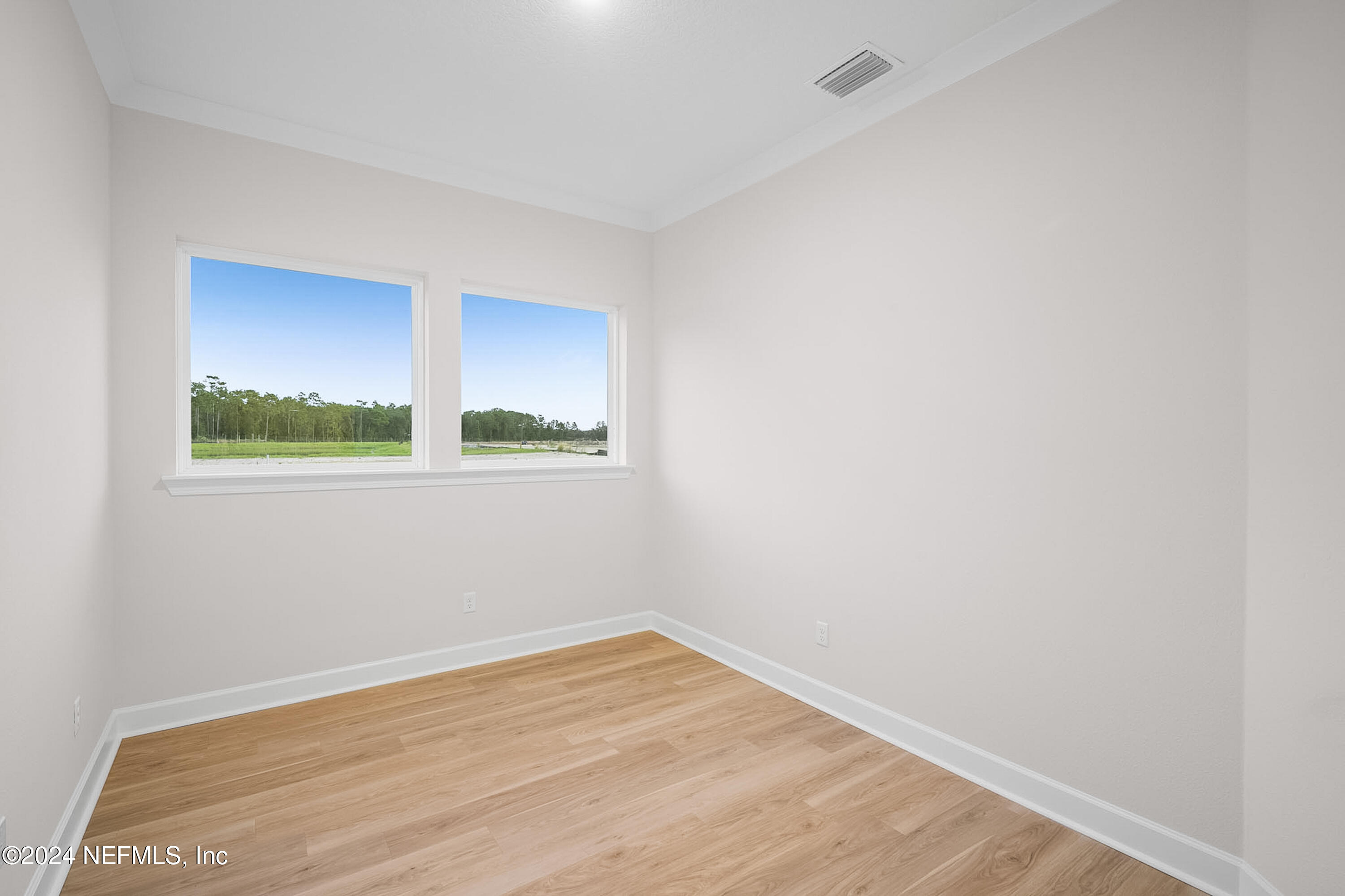 5620 Pathfinder Road Jacksonville, FL 32224 - Photo 16 of 19 a view of a room that has a window in it