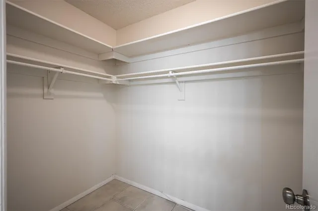 a view of an empty walk in closet