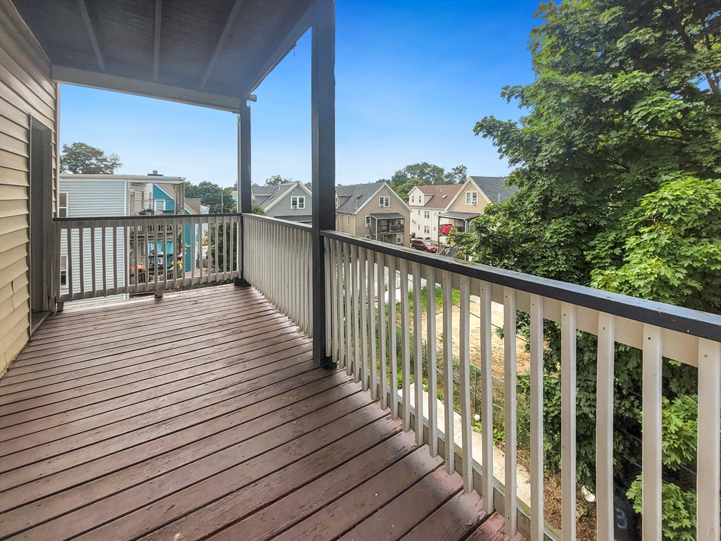 35 Dunlap Street, Unit 3 Boston, MA 02124 - Photo 8 of 9 a view of balcony with wooden floor