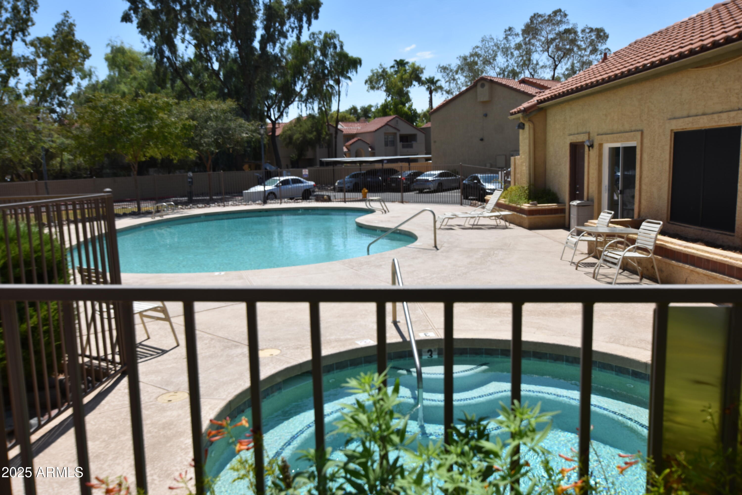 a view of swimming pool with patio