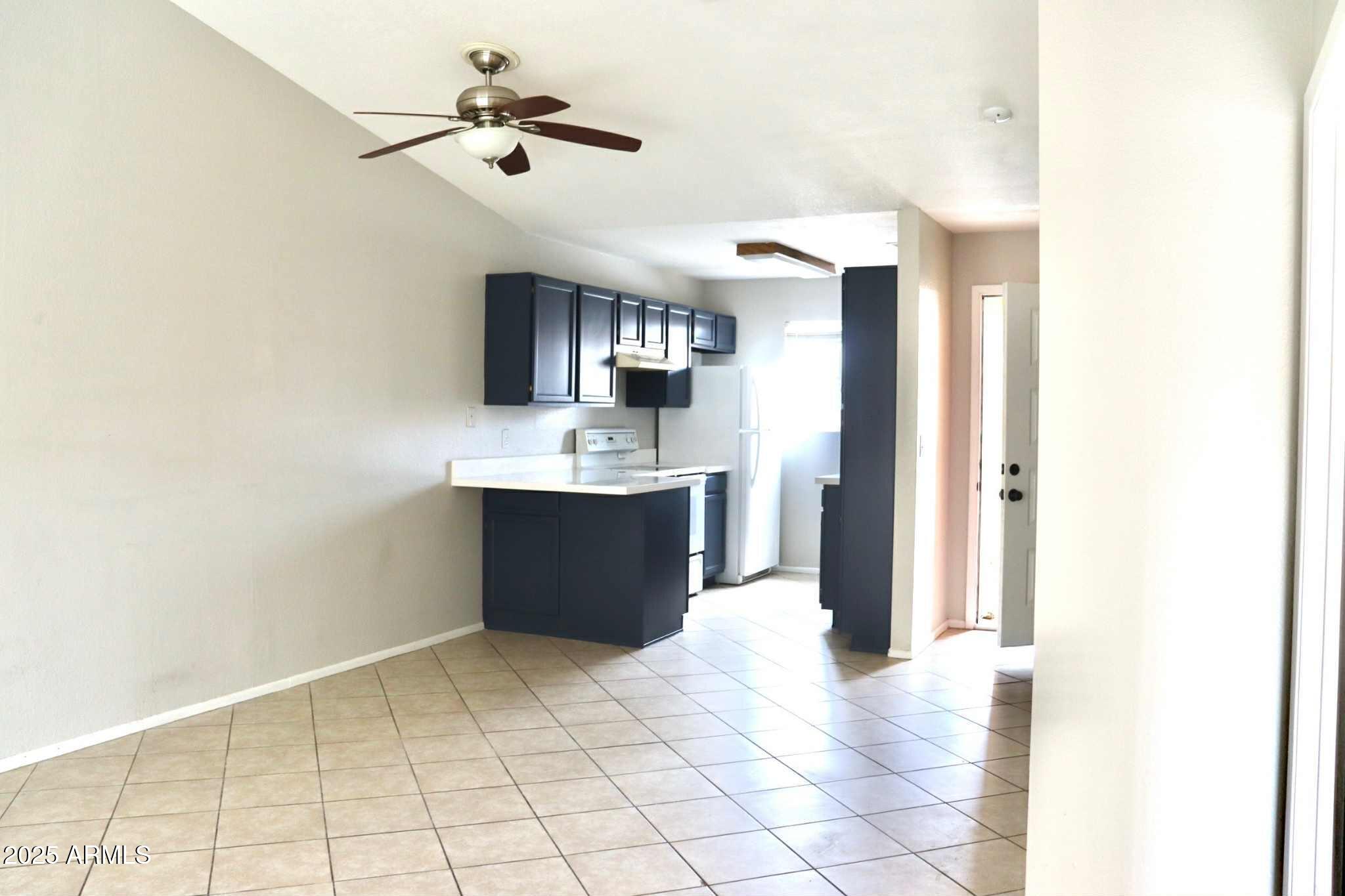 653 West Guadalupe Road, Unit 2005 Mesa, AZ 85210 - Photo 4 of 27 a view interior of a house and kitchen view