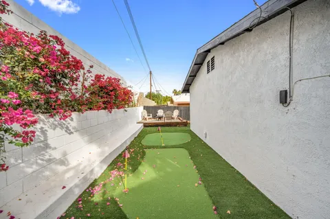 a swimming pool with a yard