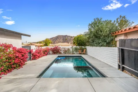 a view of balcony with wooden floor