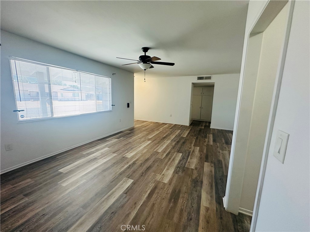 28940 Carmel Road Menifee, CA 92586 - Photo 3 of 29 Living room. Floor actually has a bit more of a gray tone. Pictures show different.