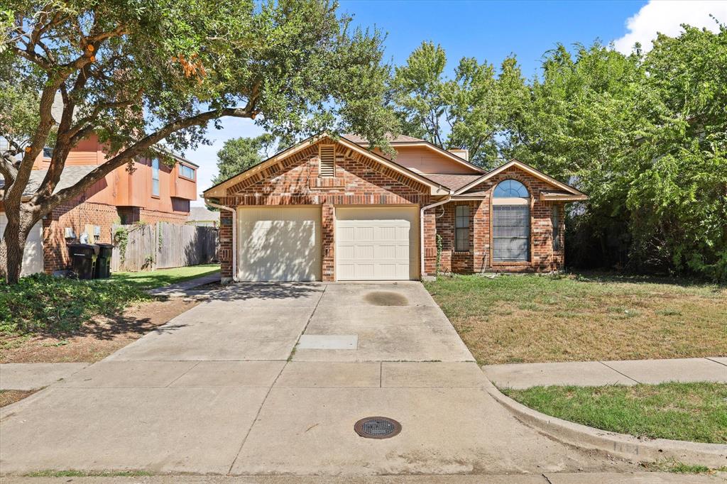 1113 Kit Lane Plano, TX 75023 - Photo 2 of 31 a front view of a house with garden