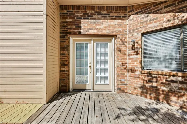 a view of wooden door and outdoor space