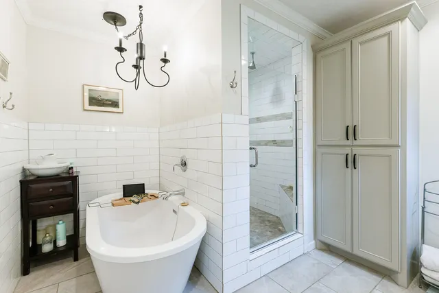 a bathroom with a granite countertop toilet sink and shower