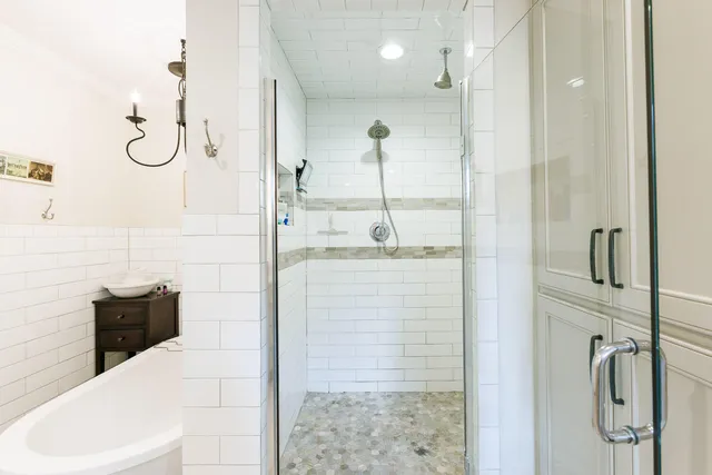 a bedroom with a bed and a table