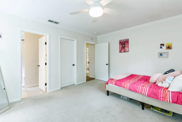 a view of a house with backyard sitting area and garden