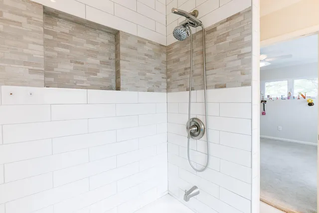 a view of a house with backyard sitting area and porch