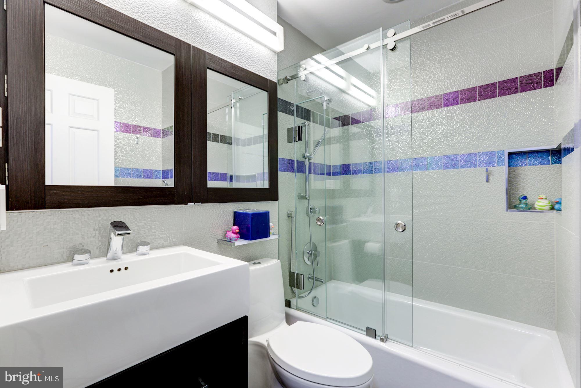 11905 Greenleaf Avenue Potomac, MD 20854 - Photo 21 of 30 Renovated hall Bathroom