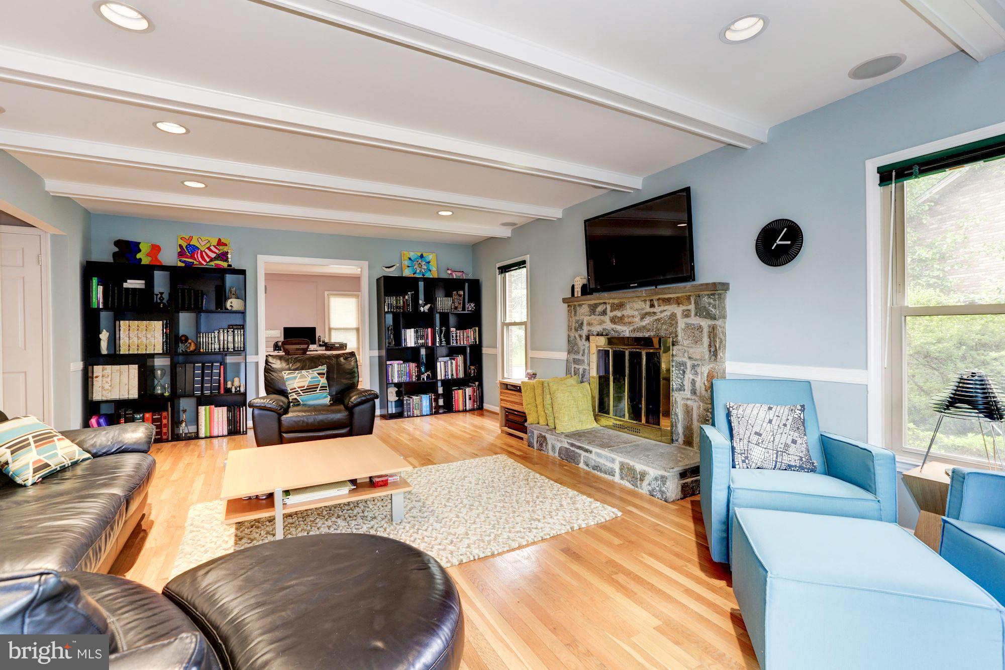 11905 Greenleaf Avenue Potomac, MD 20854 - Photo 5 of 30 Family Room with wood burning fireplace