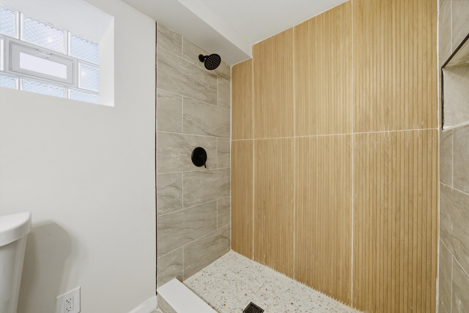 3907 West Marquette Road Chicago, IL 60629 - Photo 25 of 32 a bathroom with a shower