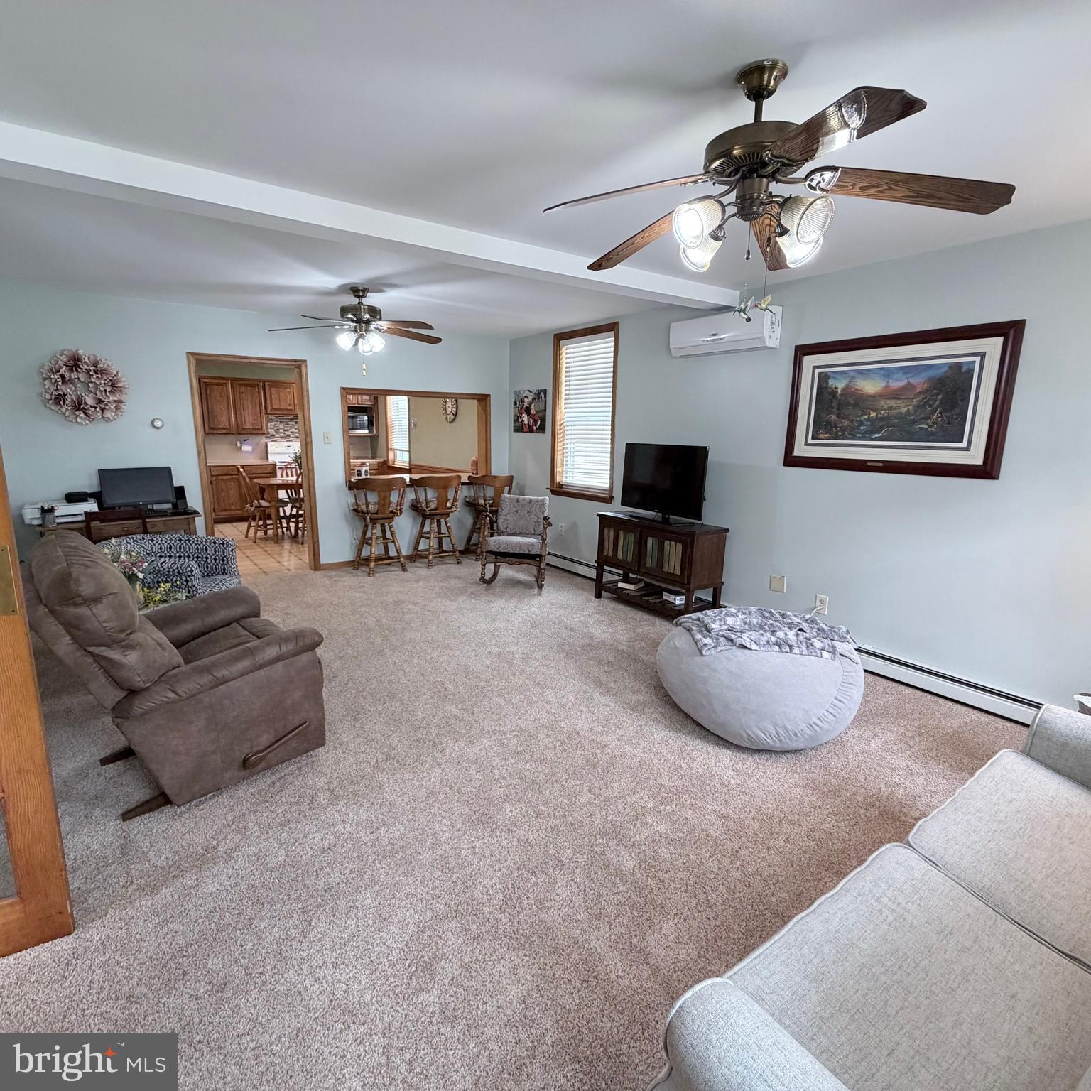 12997 Main Street Fort Loudon, PA 17224 - Photo 7 of 48 a living room with furniture and a flat screen tv