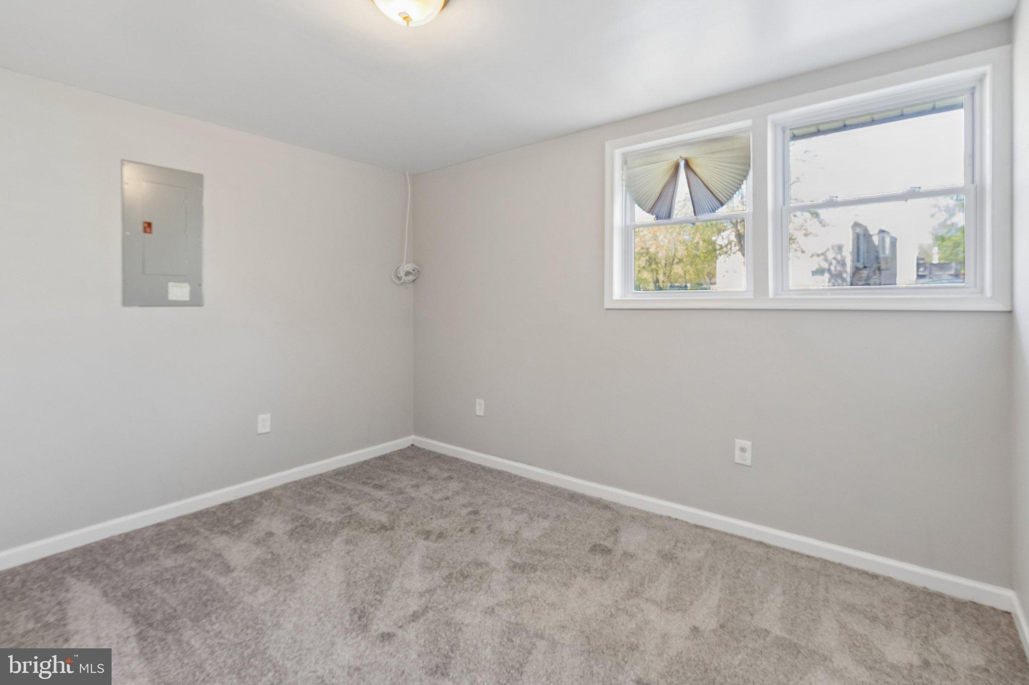 5903 Sylvia Court Clinton, MD 20735 - Photo 17 of 21 an empty room with windows and closet