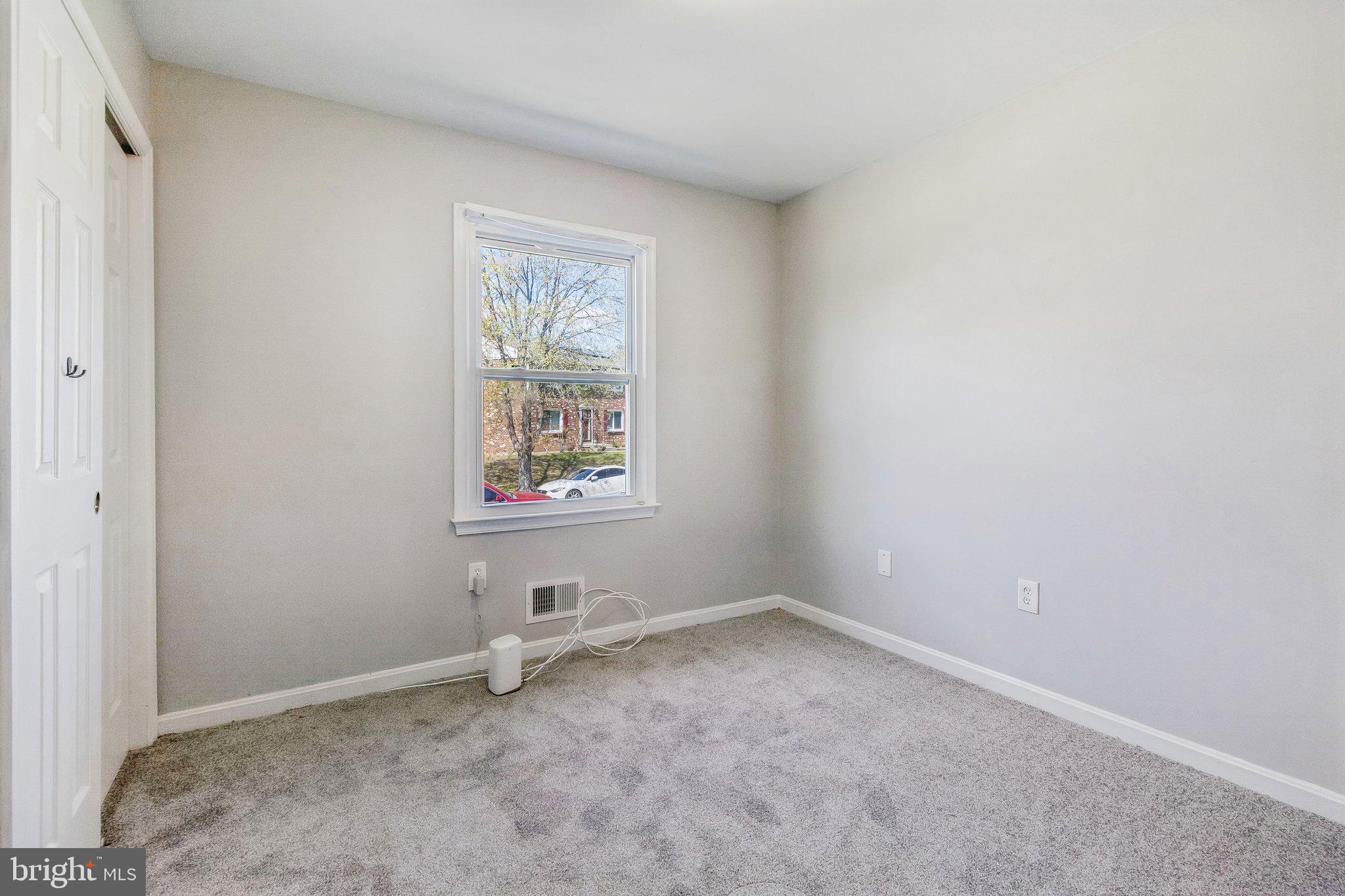 5903 Sylvia Court Clinton, MD 20735 - Photo 7 of 21 an empty room with windows