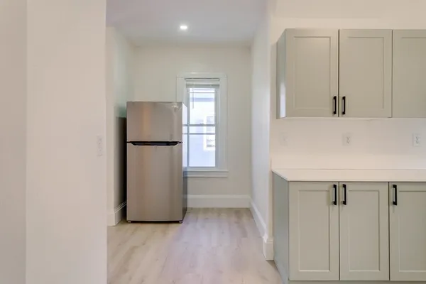 a view of a kitchen with a sink