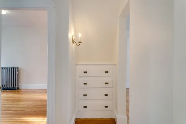 a view of a livingroom with wooden floor
