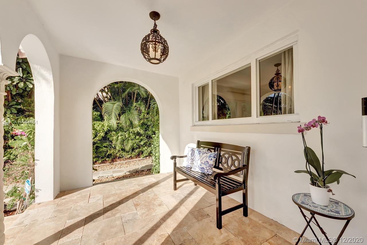 2203 North Bay Road Miami Beach, FL 33140 - Photo 3 of 36 a view of a livingroom with furniture and window