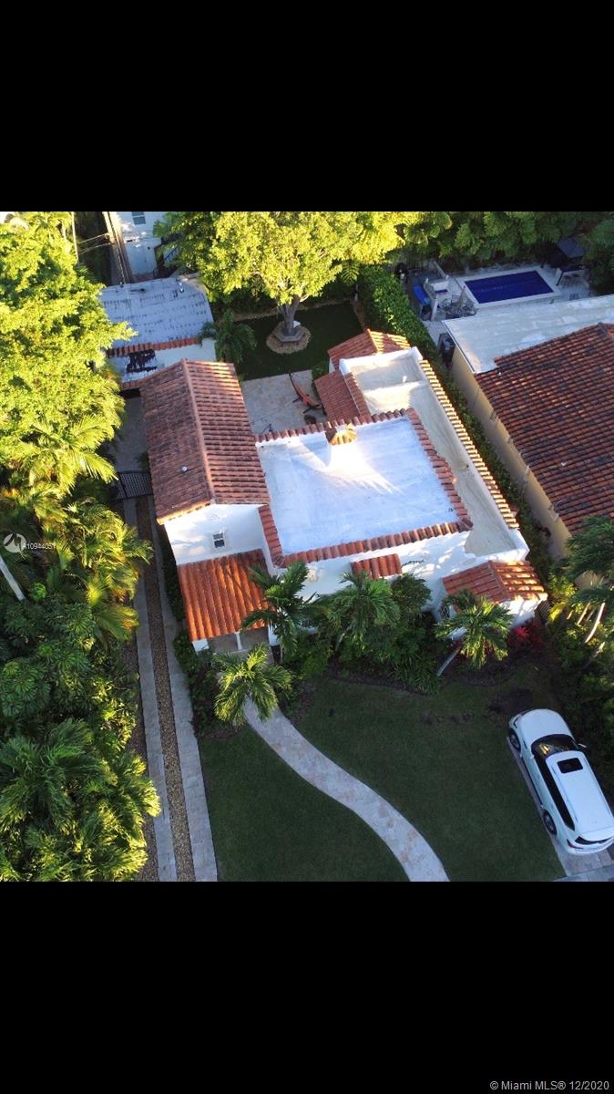 2203 North Bay Road Miami Beach, FL 33140 - Photo 34 of 36 a view of an outdoor space and yard