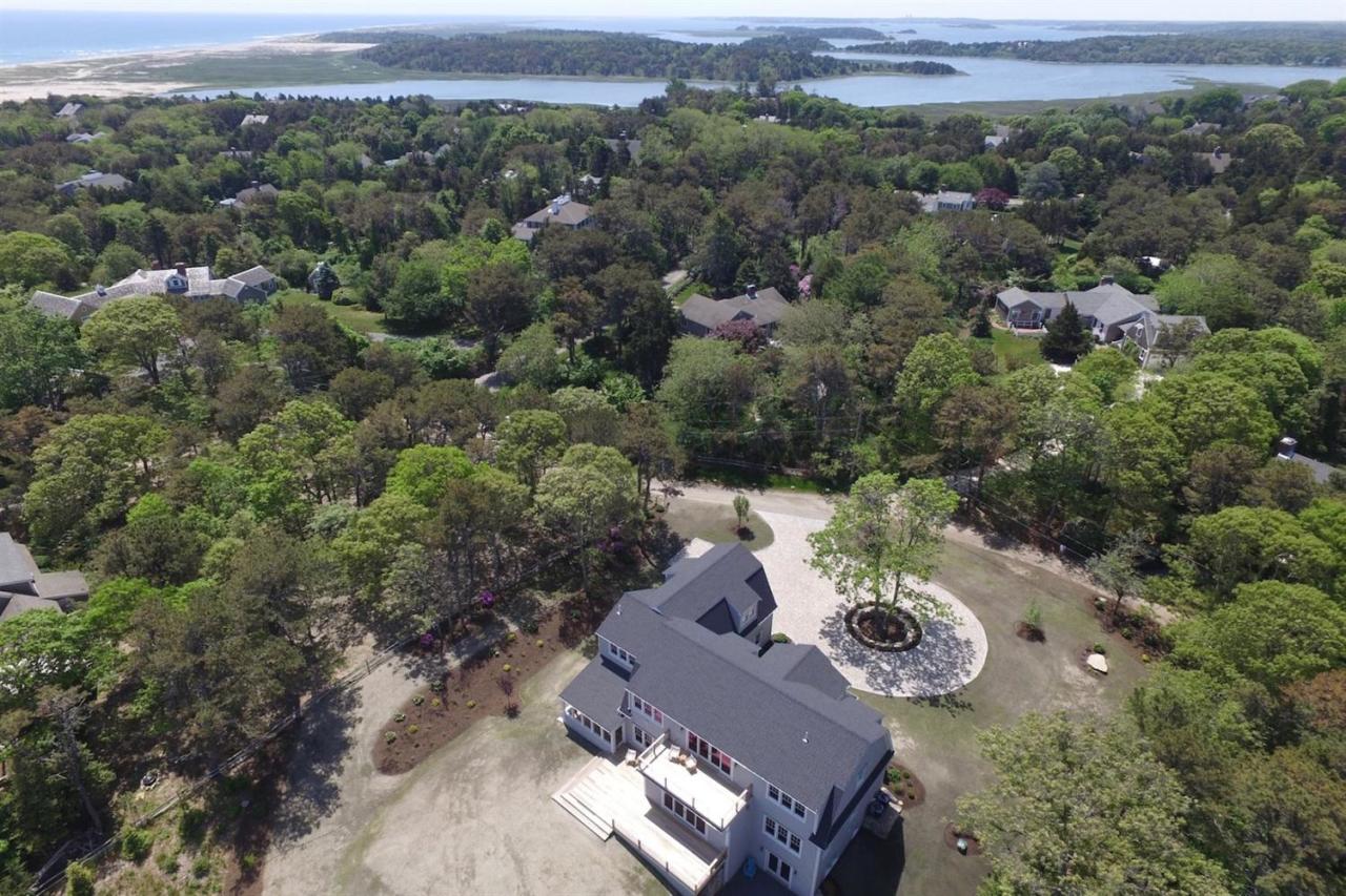 38 Woods Neck Road Orleans, MA 02653 - Photo 11 of 35 an aerial view of a house with outdoor space