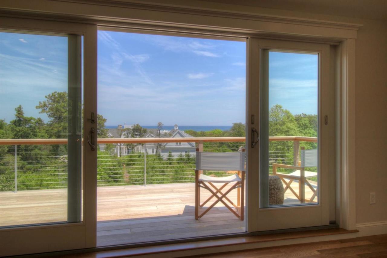 38 Woods Neck Road Orleans, MA 02653 - Photo 28 of 35 a view of a glass door with a from a window