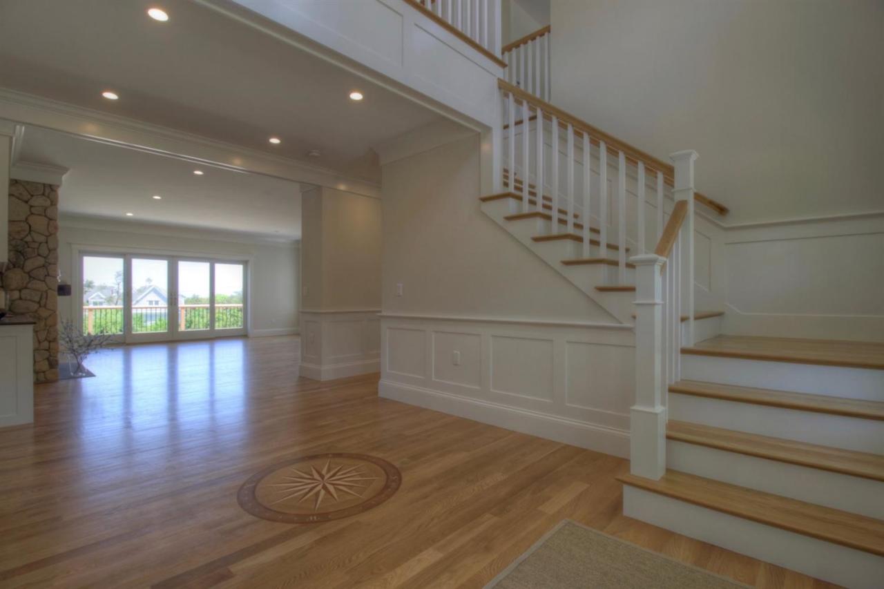 38 Woods Neck Road Orleans, MA 02653 - Photo 5 of 35 a view of entryway and hall with wooden floor