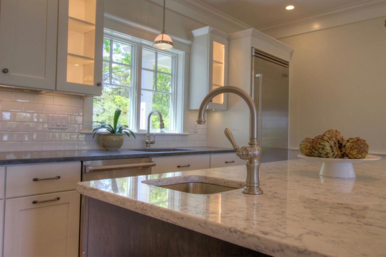 38 Woods Neck Road Orleans, MA 02653 - Photo 7 of 35 a kitchen with a sink and a large window
