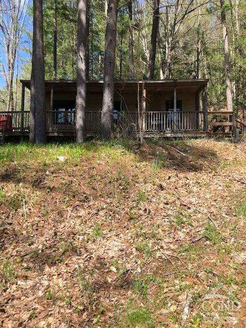 510 Mill Valley Road Middleburgh, NY 12122 - Photo 44 of 50 a front view of a house with a garden
