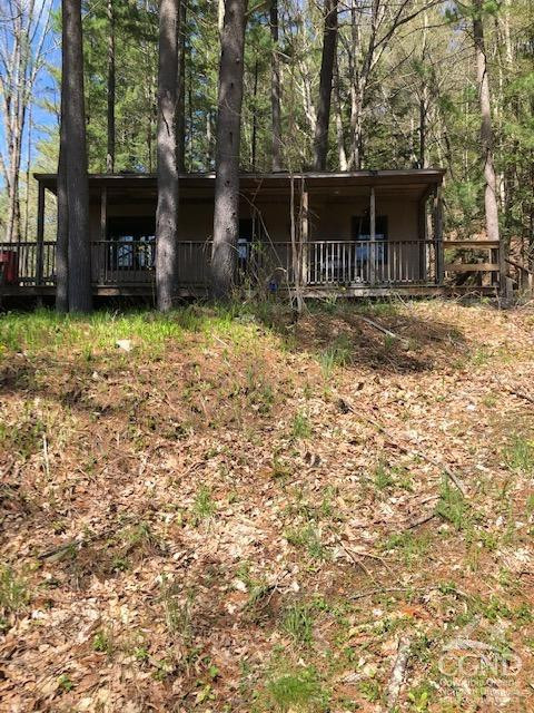 510 Mill Valley Road Middleburgh, NY 12122 - Photo 45 of 50 a front view of a house with a yard