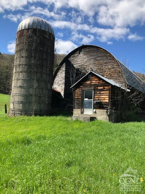 510 Mill Valley Road Middleburgh, NY 12122 - Photo 47 of 50 a view of a house with a backyard